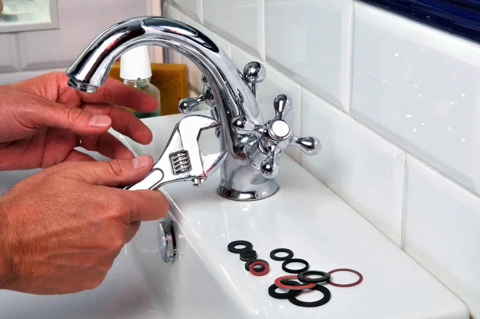 Plumber maintaining a bathroom faucet in Duarte